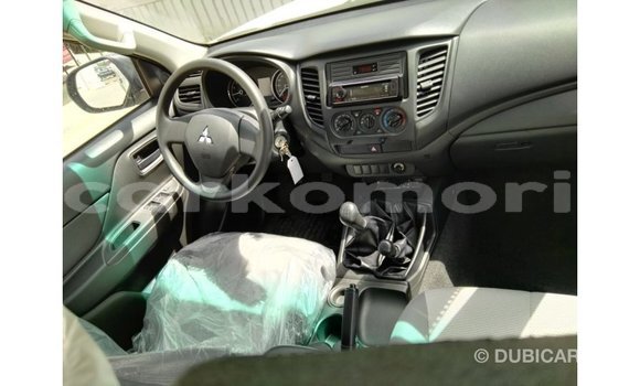 Buy Import Mitsubishi L200 White Car in Import - Dubai in Great Comore Buy Import Mitsubishi L200 White Car in Import - Dubai in Great Comore