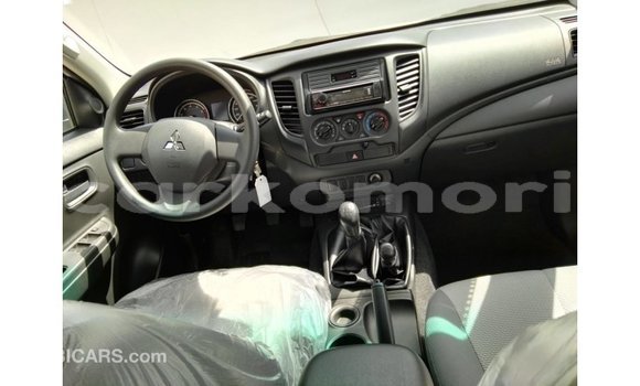 Buy Import Mitsubishi L200 White Car in Import - Dubai in Great Comore Buy Import Mitsubishi L200 White Car in Import - Dubai in Great Comore