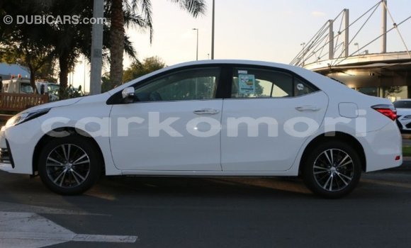 Buy Import Toyota Corolla White Car in Import - Dubai in Great Comore Buy Import Toyota Corolla White Car in Import - Dubai in Great Comore