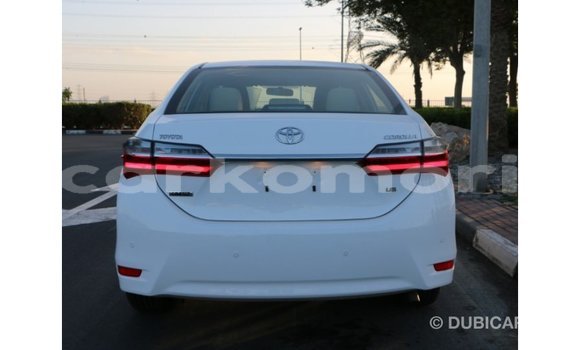 Buy Import Toyota Corolla White Car in Import - Dubai in Great Comore Buy Import Toyota Corolla White Car in Import - Dubai in Great Comore