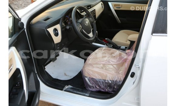 Buy Import Toyota Corolla White Car in Import - Dubai in Great Comore Buy Import Toyota Corolla White Car in Import - Dubai in Great Comore
